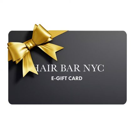A rectangular, dark gray e-Gift Card displays a large gold ribbon and bow in the top left, with “HAIR BAR NYC” in centered white text above smaller “E-GIFT CARD” on a plain white background.