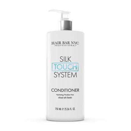 A tall white pump bottle labeled Silk Touch System Conditioner by HAIR BAR NYC PROFESSIONAL. This hydrating, paraben-free conditioner is infused with keratin and contains 750 ml (25.36 fl. oz.) of luxurious care.